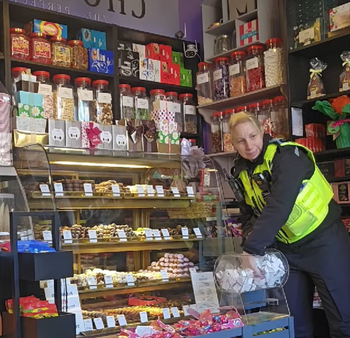 Celebrity PCSO helps with the draw.